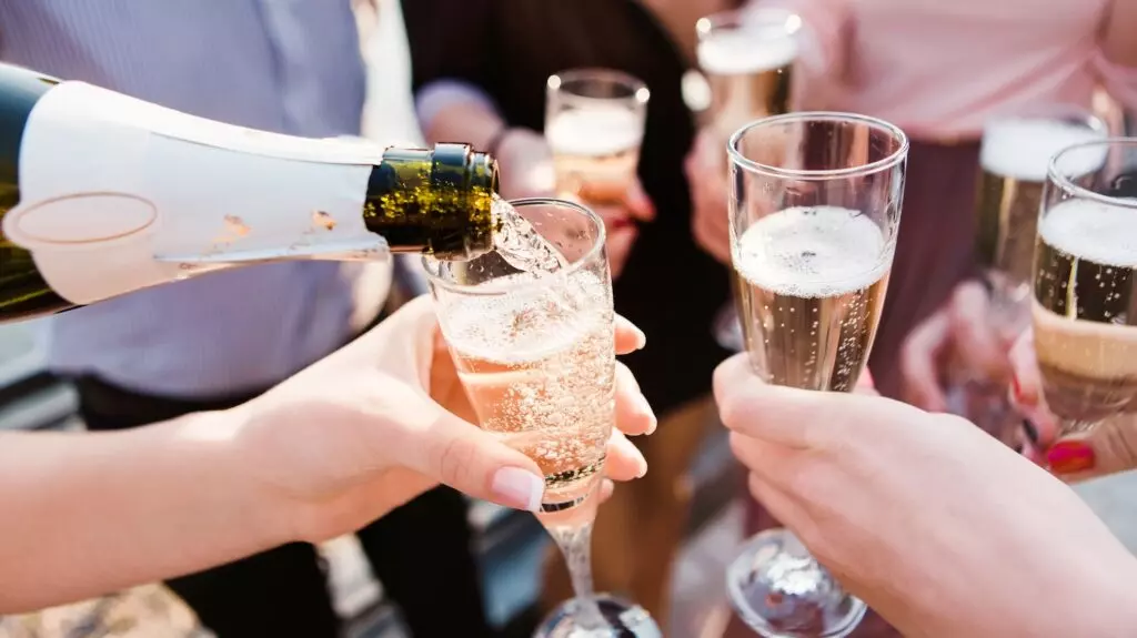 A group of people sharing glasses of champagne